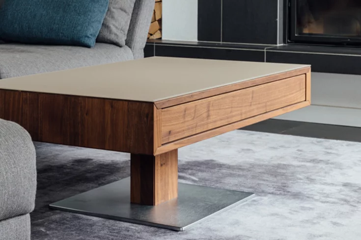 elegant lift living room table in wild walnut with matt pebble glass top