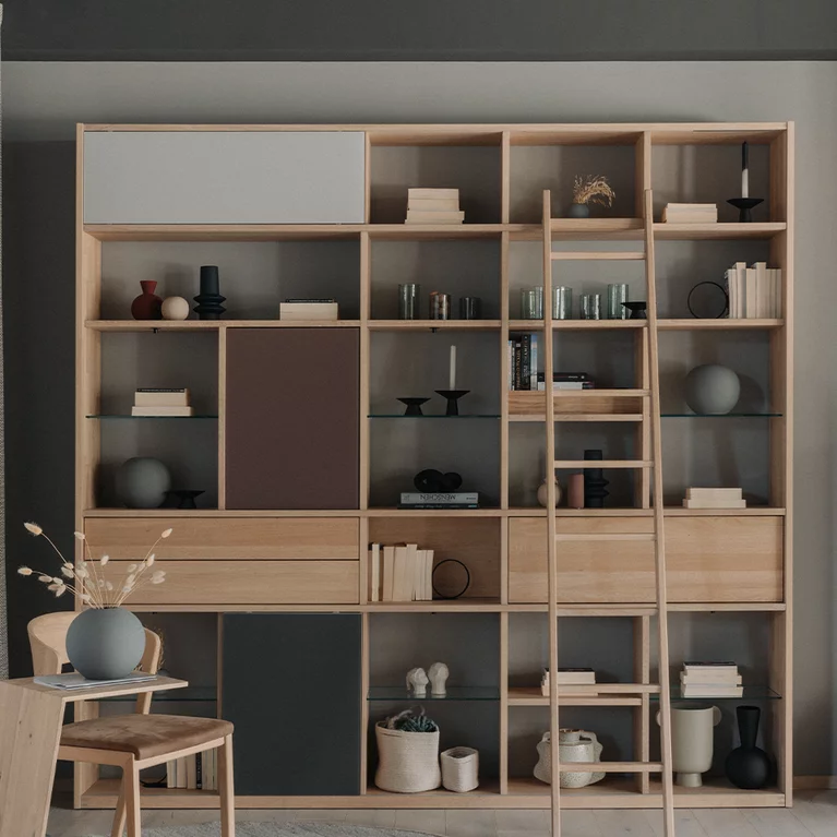 stylish cubus shelf made of solid oak white oil with various front variants and glass compartments to match the sidekick side table and the mylon chair