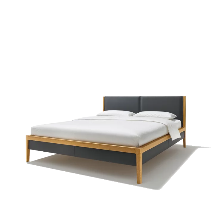 mylon solid wood bed in oak with headboard and bed sides in leather