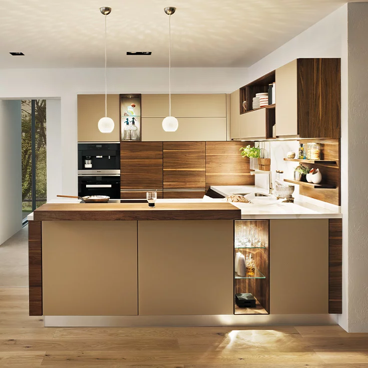solid wood kitchen linee in walnut with coloured glass fronts in sand matt