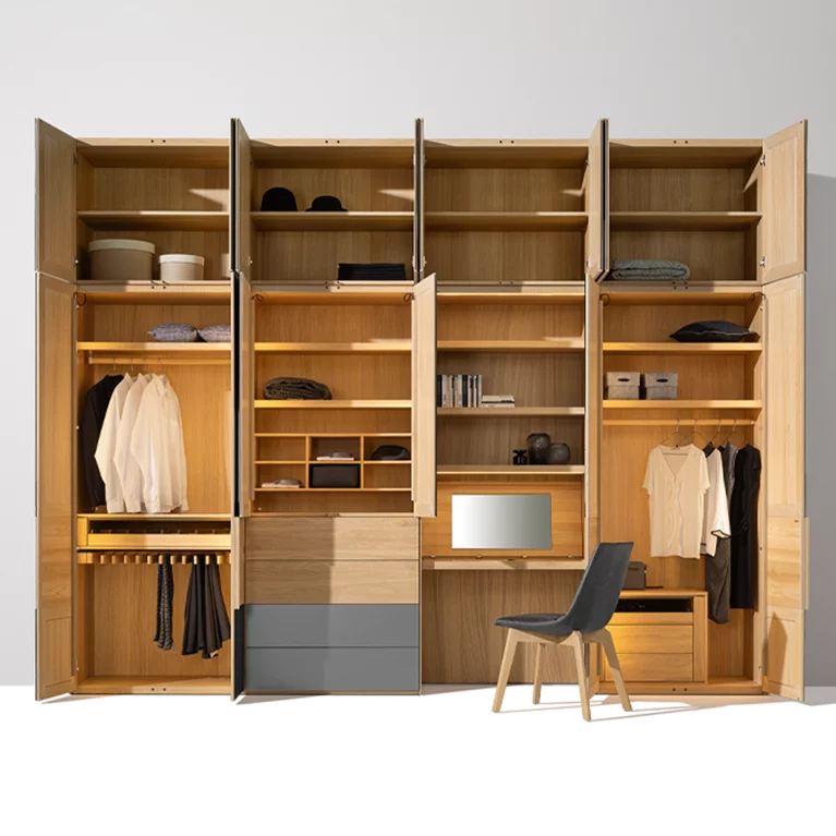 Hinged door wardrobe with solid wood interior to match the lui chair valore hinged door wardrobe illuminated with coloured glass fronts and interior in oak white oil to match the lui chair