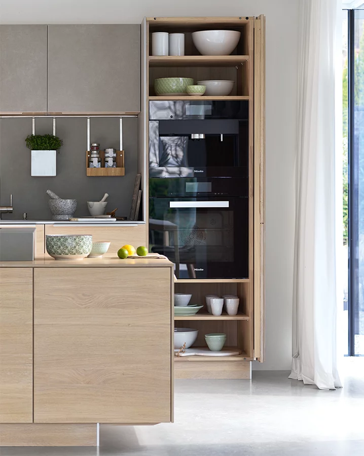 elegant natural wood kitchen filigno in oak white oil with tall unit for combination appliances